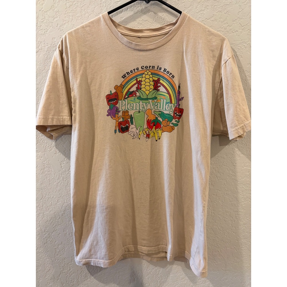 Meow Wolf Omega Mart Plenty Valley Where Corn is Born Tan Graphic T-Shirt Large
